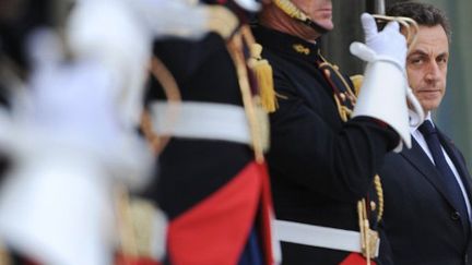 Nicolas Sarkozy devant l'Elysée (LIONEL BONAVENTURE / AFP)