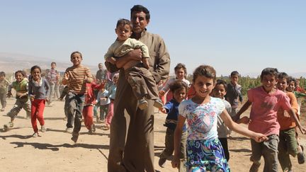 Des r&eacute;fugi&eacute;s syriens dans la vall&eacute;e de Bekaa (Liban), le 16 septembre 2014. ( AFP )