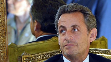 L'ex-pr&eacute;sident de la R&eacute;publique, Nicolas Sarkozy, le 27 mars 2013 &agrave; Bruxelles (Belgique). (ERIC LALMAND / BELGA)