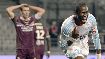 Rod Fanni (Marseille) dans le costume du sauveur (ANNE-CHRISTINE POUJOULAT / AFP)