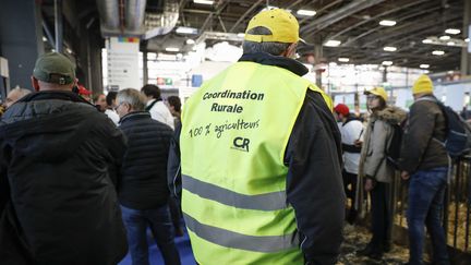 Un agriculteur de la Coordination rurale au Salon de l'Agriculture, à Paris, le 24 février 2024. (LAURE BOYER / HANS LUCAS)