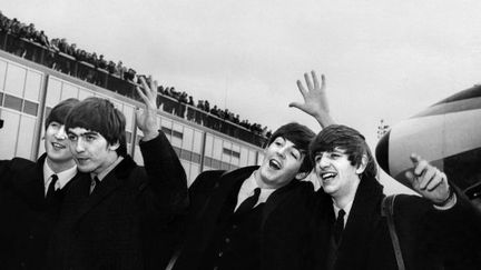 Les Beatles en 1964
 (AFP)