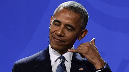 L'ancien président américain Barack Obama, lors d'une conférence de presse à Berlin (Allemagne), le 17 novembre 2016. (TOBIAS SCHWARZ / AFP)