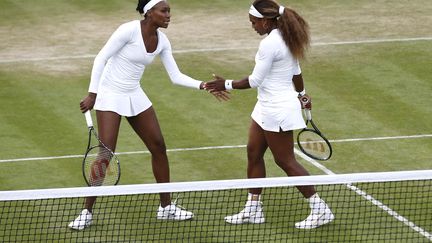  Les sœurs Williams à Wimbledon l'année dernière (ANDREW COWIE / AFP)