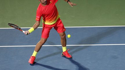 Stan Wawrinka et son look "flashy" à Dubaï (KARIM SAHIB / AFP)