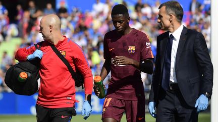 Ousmane Dembélé contraint de sortir du terrain, blessé à la cuisse à Getafe (PIERRE-PHILIPPE MARCOU / AFP)