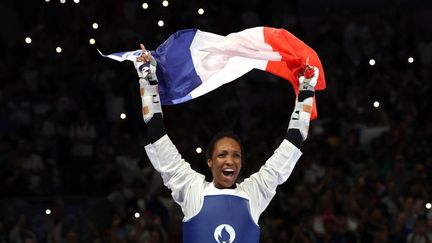 La taekwondoïste Althéa Laurin après sa victoire en finale des +67 kilos, aux Jeux olympiques de Paris, le 10 août 2024, au Grand Palais. (DAVID GRAY / AFP)