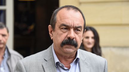 Le secrétaire général de la CGT, Philippe Martinez, quitte l'hôtel de Matignon, à Paris, le 24 juillet 2017. (BERTRAND GUAY / AFP)