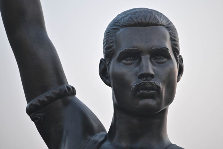 The bronze statue of Freddie Mercury, lead singer of British rock band Queen, erected by the sea on Jeju Island in South Korea, April 21, 2022. (ANTHONY WALLACE / AFP)