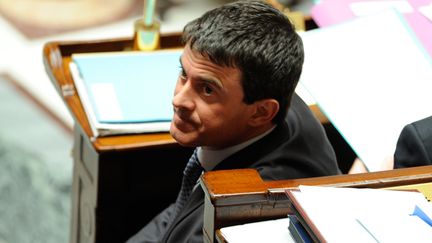 Le ministre de l'Int&eacute;rieur, Manuel Valls, sur les bancs de l'Assembl&eacute;e nationale lors des questions au gouvernement, le 4 d&eacute;cembre 2012. (WITT / SIPA)