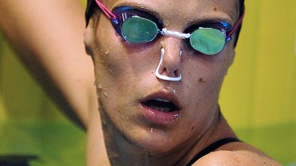 La Fran&ccedil;aise Laure Manaudou &agrave; l'entra&icirc;nement aux championnats de France de natation &agrave; Dunkerque (Nord), le 18 mars 2012. (PHILIPPE HUGUEN / AFP)