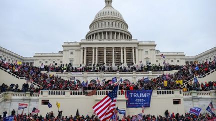 Des partisans de Donald Trump envahissent le Capitol à Washington, le 6 janvier 2021. (TAYFUN COSKUN / ANADOLU AGENCY / AFP)