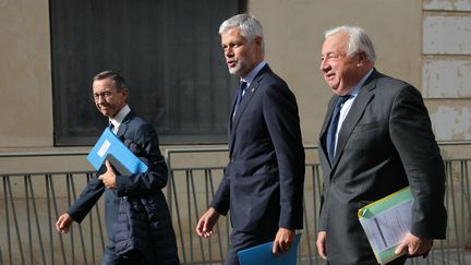 Les Républicains Bruno Retailleau, Laurent Wauquiez et Richard Ferrand avant de rencontrer Michel Barnier (THOMAS SAMSON / AFP)