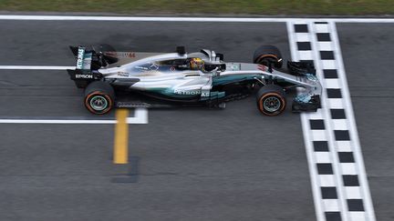 Le pilote britannique Lewis Hamilton (LLUIS GENE / AFP)