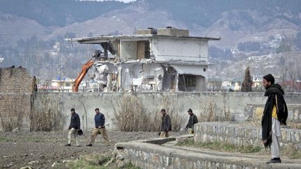 D&eacute;molition de la maison dans laquelle a &eacute;t&eacute; tu&eacute; l'ancien leader d'Al-Qua&iuml;da Oussama ben Laden &agrave; Abbottabad (Pakistan), le 26 f&eacute;vrier 2012. (REUTERS)