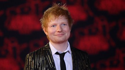 Le chanteur britannique Ed Sheeran le 20 novembre 2021 aux 23e NRJ Music Awards à Cannes (France). (VALERY HACHE / AFP)