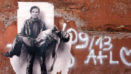 Pier Paolo Pasolini : affiche de Ernest Pignon à Rome
 (ALBERTO PIZZOLI / AFP)