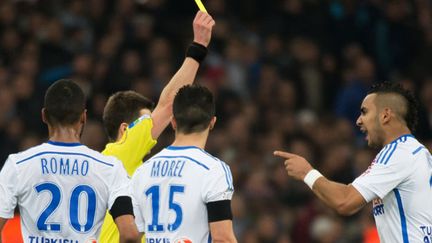 Dimitri Payet face à l'arbitre du match Marseille-Lyon