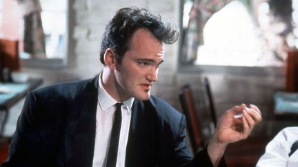 L'histoire de Quentin Tarantino à Cannes commence en 1992. Le jeune cinéaste présente Reservoir Dogs, projeté hors-compétition. Une première&nbsp;projection qui créé déjà l’événement sur la Croisette. (LIVE ENTERTAINEMNT / DOG EAT DOG)