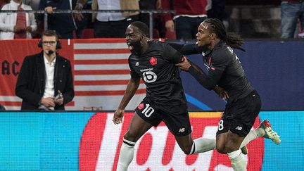 La joie des Lillois après le but de Jonathan Ikoné face à Séville en Ligue des champions le 2 novembre 2021. (JORGE GUERRERO / AFP)