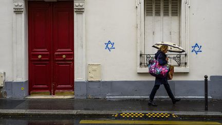 Stars of David tagged on buildings in the 14th arrondissement of Paris, October 31, 2023. (JF ROLLINGER / AFP)