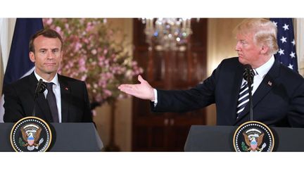 Emmanuel Macron et Donald Trump, mardi 24 avril 2018 lors d'une conférence de presse organisée à la Maison Blanche (Etats-Unis). (LUDOVIC MARIN / AFP)