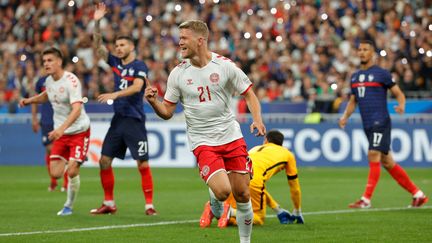 Entré quelques minutes plus tôt, Andreas Cornelius a ajusté le gardien français du plat du pied, vendredi 3 juin 2022. (GEOFFROY VAN DER HASSELT / AFP)