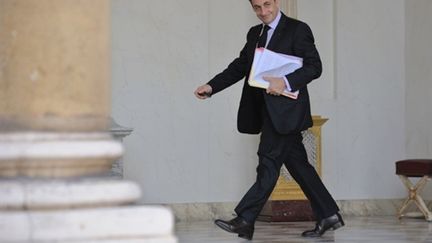 Nicolas Sarkozy arrive à l'Elysée, le 16 mars 2011. (AFP - Eric Feferberg)