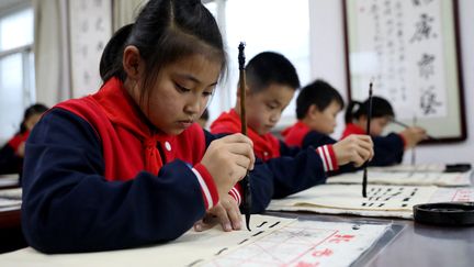 Des écoliers en Chine, le 8 octobre 2021. (LUO XUEFENG / XINHUA / AFP)