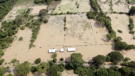 Des cultures submergées dans le sud-est du Salvador, près de Bajo Lempa, le 20 octobre. (OSCAR RIVERA / AFP)