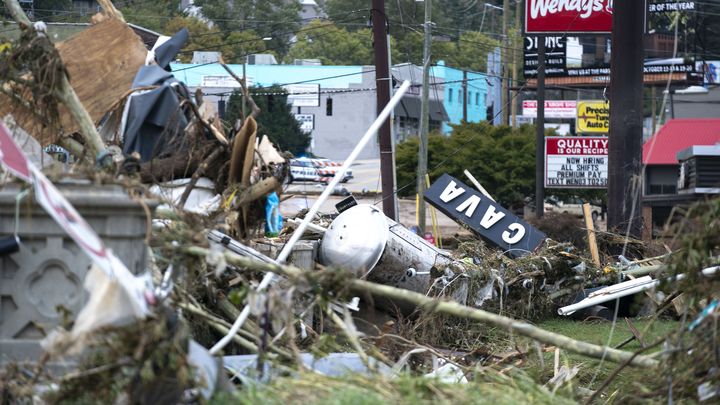 The sign of a restaurant located in the Biltmore Village neighborhood near Asheville, North Carolina, fell to the ground with the hurricane. This neighborhood was partially destroyed on September 28, 2024. (SEAN RAYFORD / GETTY IMAGES NORTH AMERICA)