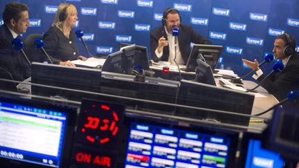 Le pr&eacute;sident candidat Nicolas Sarkozy, invit&eacute; de la matinale d'Europe 1 le 14 mars 2012. (LIONEL BONAVENTURE / AFP)