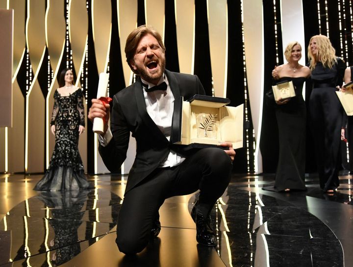 Swedish director Ruben Östlund expresses his joy after winning the Palme d'Or award for the film The Square during the 70th Cannes Film Festival in Cannes, France on May 28, 2017. (PHILIP ROCK / ANADOLU AGENCY )