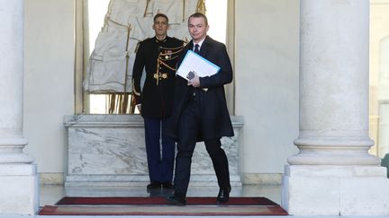 Olivier Dussopt, secrétaire d'État&nbsp;auprès du ministre de l'Action et des Comptes publics, à la sortie de l'Élysée en 2018. (LUDOVIC MARIN / AFP)