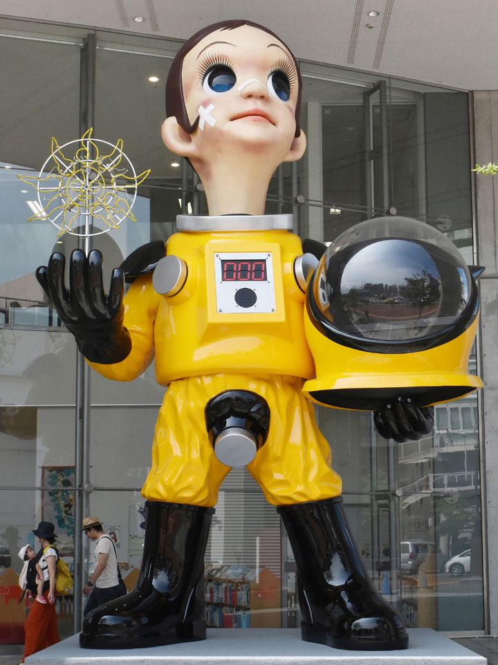 La statue "Sun Child" de Kenji Yanobe doit symboliser la renaissance de la région après la catastrophe de 2011
 (JIJI PRESS / AFP)