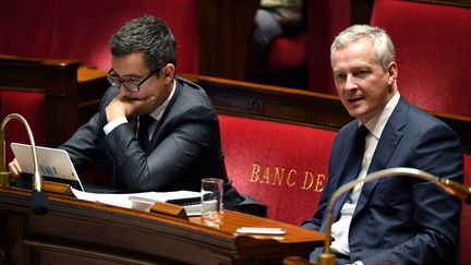 Le ministre de l'Action et des Comptes publics, Gérald Darmanin, et le ministre de l'Economie, Bruno Le Maire, le 24 octobre 2017 à l'Assemblée nationale. (ERIC FEFERBERG / AFP)