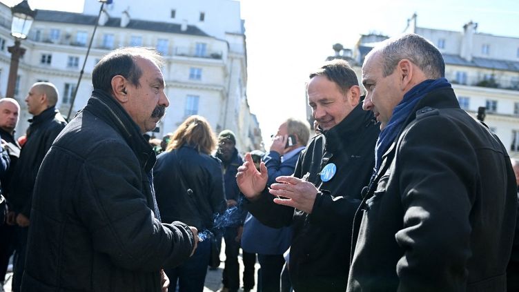 Philippe Martinez and Laurent Berger in Paris, March 16, 2023. (ALAIN JOCARD / AFP)