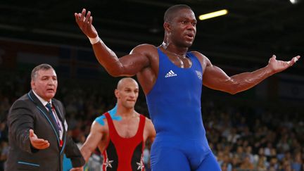 Le Fran&ccedil;ais&nbsp;M&eacute;lonin Noumonvi, champion de lutte gr&eacute;co-romaine, &agrave; Londres (Royaume-Uni), le 6 ao&ucirc;t 2012. (ADREES LATIF / REUTERS)