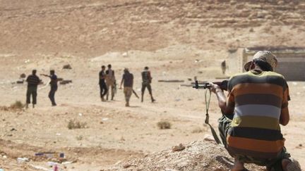 Des combattants du CNT, ce mardi 27 septembre. (AFP PHOTO/KARIM SAHIB)