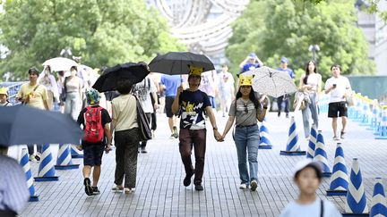 Un couple à Yokohama, en août 2023. (DAVID MAREUIL / ANADOLU AGENCY VIA AFP)