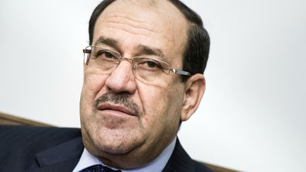 Nouri Al-Maliki, le 23 juin. Le premier ministre irakien n'a pas d&eacute;missionn&eacute;, mais le pr&eacute;sident a d&eacute;sign&eacute; son successeur, le 11 juin. (BRENDAN SMIALOWSKI / AFP)