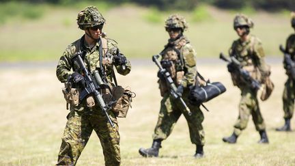 Des soldats canadiens, lors d'un exercice, en Pologne, le 9 juin 2014. (REUTERS)