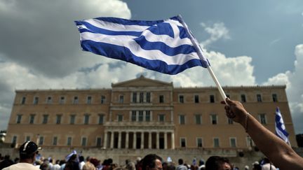 Des manifestants devant le Parlement grec, le 19 septembre 2012 &agrave; Ath&egrave;nes.&nbsp; (ARIS MESSINIS / AFP)