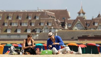 Deauville sa plage et ses belles villas, un jour de juillet 2013
 (CHARLY TRIBALLEAU / AFP)