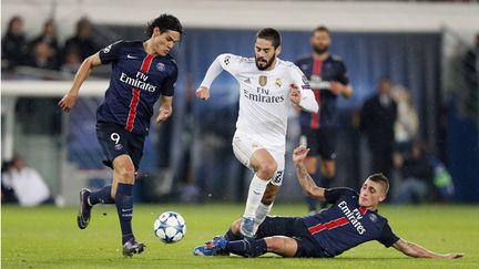 &nbsp; (Les parisiens Edinson Cavani et Marco Verratti, et le madrilène Isco Alarcon ce mercredi 21 octobre © MaxPPP)