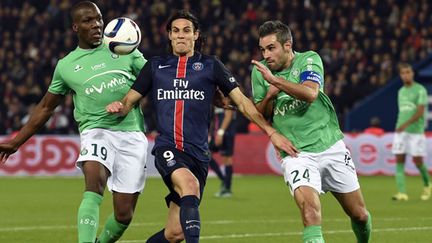 Edinson Cavani à la lutte avec Loïc Perrin et Florentin Pogba