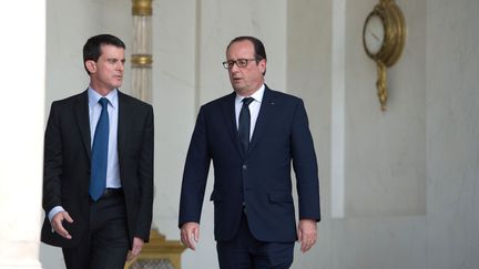 Le Premier ministre Manuel Valls et le pr&eacute;sident Fran&ccedil;ois Hollande &agrave; l'Elys&eacute;e &agrave; Paris, le 1er ao&ucirc;t 2014. (LCHAM/SIPA)