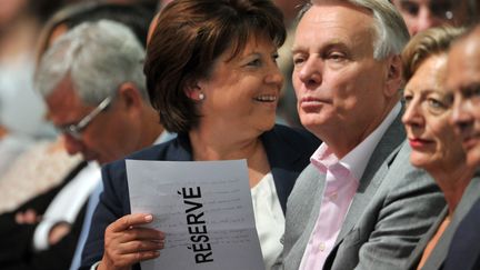 Martine Aubry et Jean-Marc Ayrault &agrave; l'universit&eacute; d'&eacute;t&eacute; du Parti socialiste &agrave; La Rochelle (Charente-Maritime), le 26 ao&ucirc;t 2012. (PIERRE ANDRIEU / AFP)