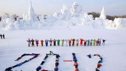 C'est un des quatre plus grand festival de sculptures sur glace au monde qui vient d'&ecirc;tre officiellement inaugur&eacute; en Chine. (AP / SIPA)