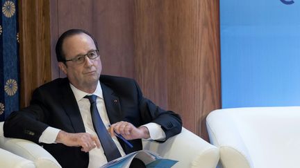 Le président François Hollande assiste à un forum économique à Amman (Jordanie), le 19 avril 2016. (JACQUES WITT / AFP)